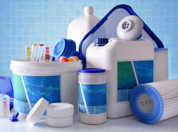 group of pool cleaning products together they are primarily white and blue